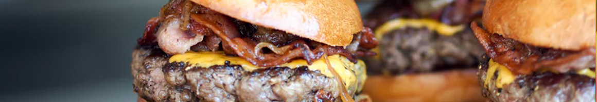 Eating American (Traditional) Burger Southern at The Beacon Drive-in restaurant in Spartanburg, SC.